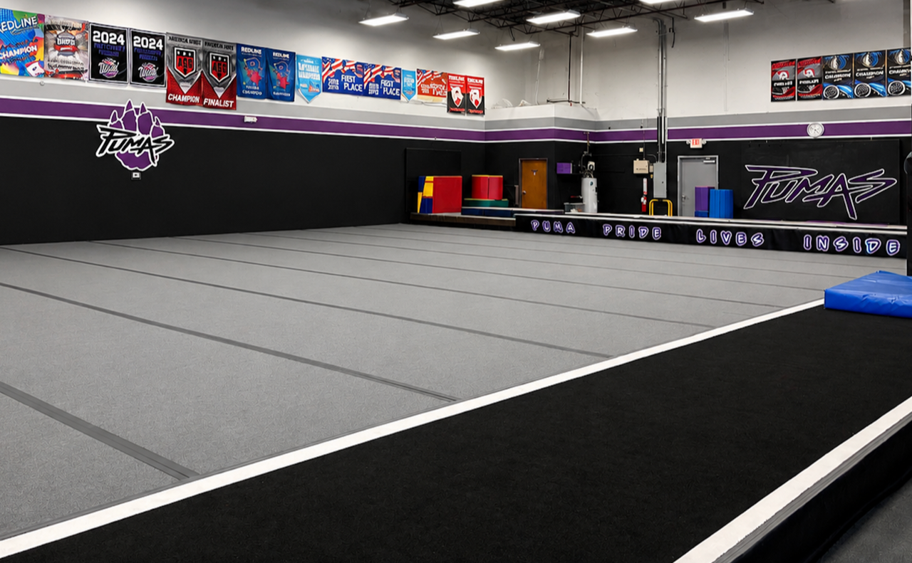 Puma Cheer gym with team